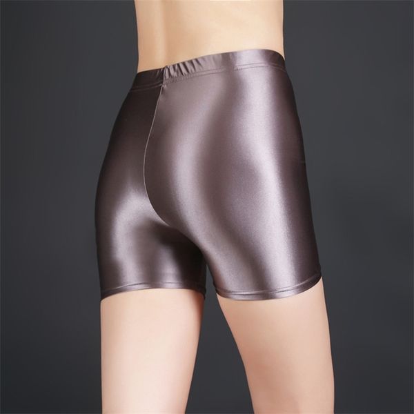 Sexy femmes bonbons couleur sécurité Shorts pantalons huile Gloosy sans couture taille haute culotte brillant bas porter grande taille Sexy F25 210730