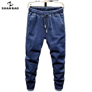SHAN BAO Automne Marque Taille élastique Cordon Stretch Jeans Style classique Plus Taille Harlan Denim Jeans en vrac 210531