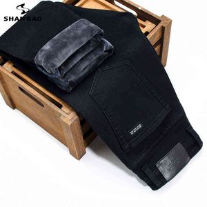 SHAN BAO hiver marque ajusté droite Stretch pur noir jean Style classique hommes mode polaire épais chaud Slim jean 211120