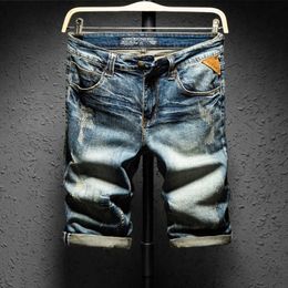 Shanbao Trend Heren Zomer Denim Shorts Retro Stijl Oude Lederen Designer Dunne Gat Rechte Katoenen Jeans Shorts 210531