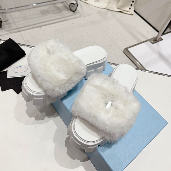 Shearling Luxury Fur Slipper Room Designer Mules Sandalias para mujer Lana Invierno Cálido Australia Zapatos para el hogar Suela de goma Zapatillas de tela Fluffy Top Calidad