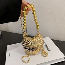Shell Metallic Mini Heart Handbags Perles Perls Perls Crossbody Sacs For Women Luxury Women's Designer Bag Sac Socs Rouages à lèvres