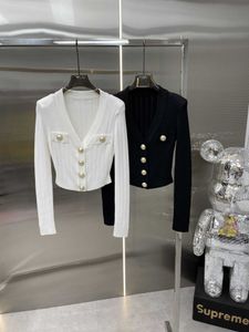 Shenzhen high -end dames kledingknop slanke ijs zijden gebreide vest mouw short jas