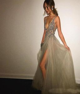 Glanzende Berta Silver Beading Tule Long Prom -jurken 2017 Deep V Neck Sheer Brapts Sexy Backless avondfeestjurken Dij S6846042