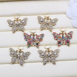 Shiny Butterfly Crystal Charm Oorbellen Dubbeletter Designer Studs Gekleurde Diamond Sieraden Groothandel