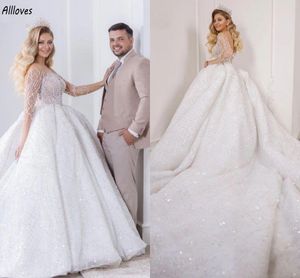 Vestido de fiesta de encaje con lentejuelas brillantes Vestidos de novia con mangas largas Cuello transparente Sin espalda Vestidos de novia formales de la iglesia Dubai Tren de la catedral árabe Vestidos De Novia CL3042