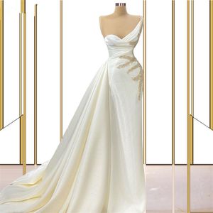 Glanzende witte avondjurk zeemeermin een schouder goud geappliceerd formele partij celebrity prom dresses robe de mariée