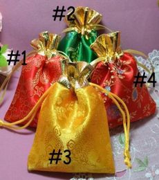 Navire 100pcs 1012cm Sac de soie de haute qualité sacs de bijoux de mariée Bages-cadeaux Bags-cadeaux