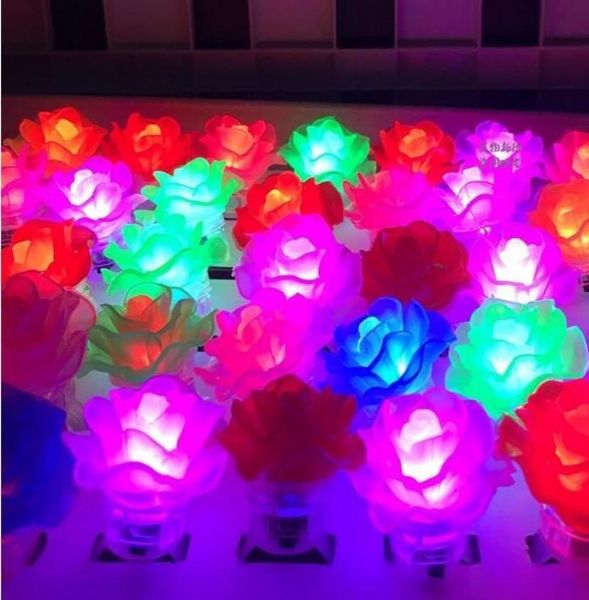 Navire 100pcs brillance LED LED UP clignotant Rose Flower Bubble Elastic Anneau rave Party clignotant des feux de doigt doux pour la fête Disco5570489