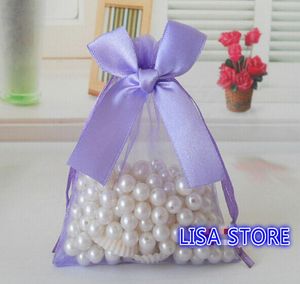 Expédier 100 pièces différentes tailles sacs en Organza Bowknot papillon entreprise emballage promotionnel sac Sachet bonbons perles cadeau de noël9771331