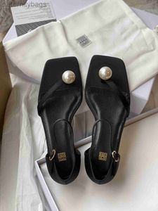 Schoenen Dames Toteme The Pearl Flats Zwarte Toteme platte sandalen geaccentueerd met een elegante imitatieparel aan de teenband Katoen-zijde satijn en leren enkelband SADH