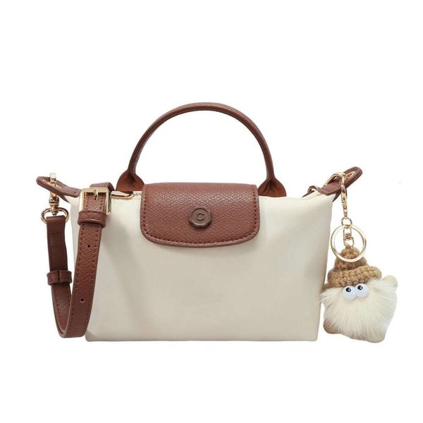 Acheter le sac à bandoulière à la vente la plus vendue nouvelle promotion d'usine 85% Factory American Bison Commuter Bag New Womens Crossbody Automne et Winter Handheld Dumpling Xiang Sac