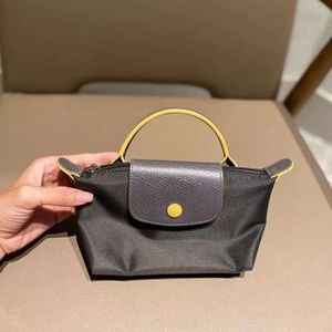 Boutique sac à bandoulière pas cher exportation Mini femmes Mobile poignée courte boulette de poche
