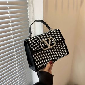 Winkelontwerp Handtas Groothandel Retail 2024 Nieuwe mode Diamant Inbedding Handheld Wern Style Advanced Light Luxury Bag