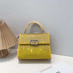 Sac à main de conception de boutique sac à main de vente au détail avec diamant à la mode pour femmes 2024 Nouvelle épaule portable de style de mode haute tendance
