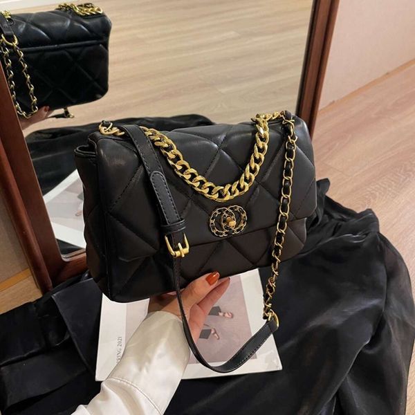 Tienda Fábrica Venta al por mayor Nueva moda y ocio Pequeño bolso de estilo fragante para mujer Moda Diagonal Cross Ling Grid Chain Advanced Western