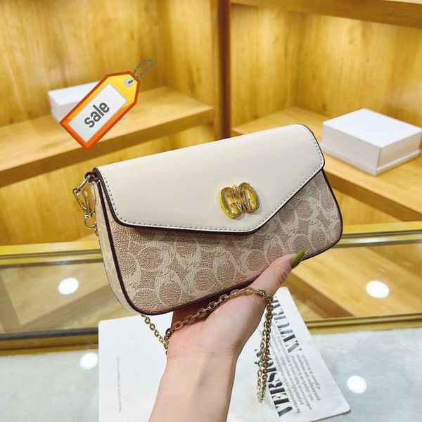 Tienda en línea salida pequeño bolso cuadrado para mujer 2024 verano nueva moda axila cadena impresa crossbody