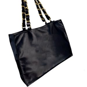 Le sac à provisions peut être une épaule à portée oblique sac à main style unique décontracté capacité pratique grande chaîne