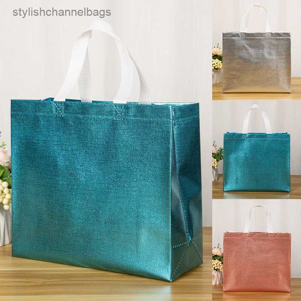 Bolsas de compras Bolsa de compras láser impermeable a la moda Bolsa ecológica Bolsa de compras reutilizable grande Bolsa de asas Bolsa de supermercado de tela no tejida laminada