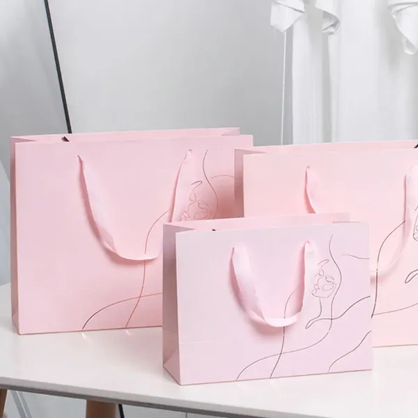 Sacs de courses de luxe avec impression d'estampage en or Rose, sac à poignée Rose, emballage en papier personnalisé avec ruban de soie, cadeau