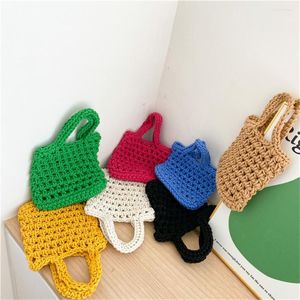 Sacs à provisions paille tressée tricoté sac à main enfants couleurs vives évider sac fourre-tout mode Crochet poignet femme sacs à main