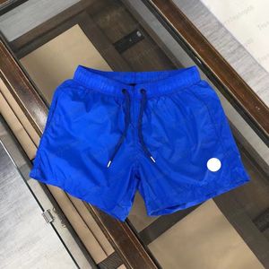 Pantalones cortos para hombre, pantalones cortos de diseñador, bañadores cortos para hombre, pantalones de playa para mujer, etiqueta bordada, pantalones cortos deportivos impermeables de secado rápido, tendencia pura y transpirable plana