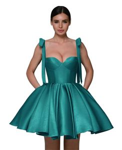 Korte Homecoming-jurken Satijnen spaghetti sweetheart baljurk veterzakken plus size afstudeerjury prom formal avondjurk hc22