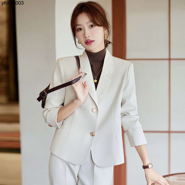 Chaqueta corta de traje blanco para mujer primavera y otoño nuevo conjunto pequeño de estilo fragante de sensación informal