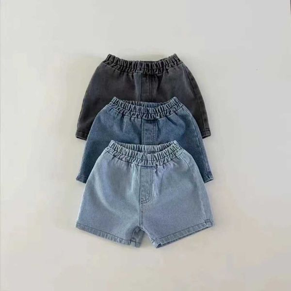 Shorts 2023 Summer Nuevo bebé denim Infantil para niños sólidos Jeans de bolsillo Pantalones casuales Pantalones de moda H240423