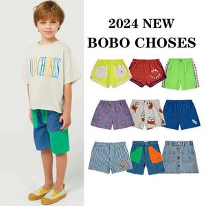 Shorts 2024 Nouveaux enfants t-shirts Summer Fashion T-shirt mignon T-shirt Cartoon Youth Clothing Boys and Girls Clothing Set D240516