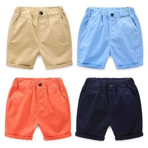 Shorts de Peach New Childrens Shorts décontractés Coton solide Coton Solide Baby Girls Boîte de plage Shorts pour enfants 2-8 ans D240516