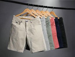 Pantalones cortos para hombres, Bermudas de algodón deportivas informales, ropa de moda de verano para hombres, pantalones cortos hasta la rodilla de Color sólido 2022