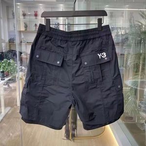 Shorts Men Femmes Pantalons de plage Y3 Vêtements de travail sportifs en polyester décontracté avec conception de poches