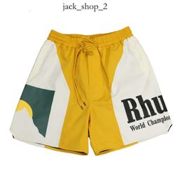 Pantalones cortos para hombre Rhude Diseñador Short Men Summer Secado rápido Mesh Mesh Drawstring Beachwear Sports Flow Sports para hombres 939