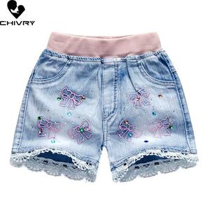 Shorts New 2022 Childrens and Girls Summer Denim Shorts Baby Girl Baby Cartoon Borded Lace Shorts Worths informales D240510