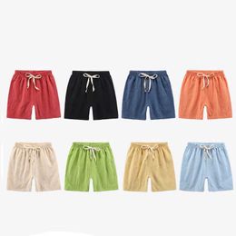 Shorts shorts 2-12y garçons et filles shorts coton coton d'été chabots sports shorts coréens lâches occasionnelles bonbons bleu rouge noir kaki shorts en lin short wx5.22