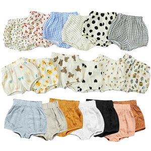 Shorts shorts bébé salon d'été en coton shorts de couleur solide imprimées respirantes adaptées aux vêtements unisexes Bloomer garçons et filles coréen mignon pant pant wx5.22