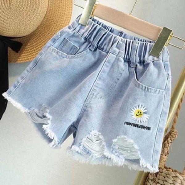 Pantalones cortos Tamaño de 100-160 cm pantalones cortos para niñas pantalones cortos de mezclilla de verano pantalones de playa pantalones calientes sueltos de niña infantil pantalones cortos WX5.22