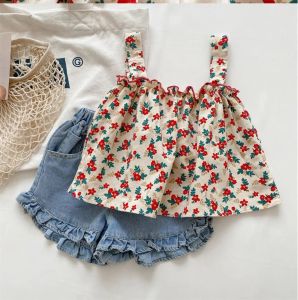 Shorts Summer Baby Girls Floral Print Set Migne Toddler Floral Strap Shirt + Denim Ruffle Shorts 2pcs Tenues de style coréen de style coréen