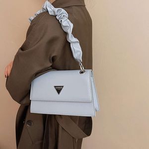 Les créateurs de sacs à bandoulière vendent des sacs unisexes de marques populaires chaîne plissée sous les bras nouveau Style étranger épaule femmes