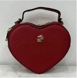 Bolso de hombro Compradores Bolsas de asas Bolso de cuero de PU de alta calidad Bolsos de diseñador Bolsos Monederos en forma de corazón Bolsos cruzados de moda Co0127