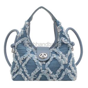 Sacs à bandoulière 2023 Nouveau style gland sac en toile de couleur unie Mode féminine chiffon de niche haut de gamme sac à main assorti complet épaule sac à mainstylishhandbagsstore