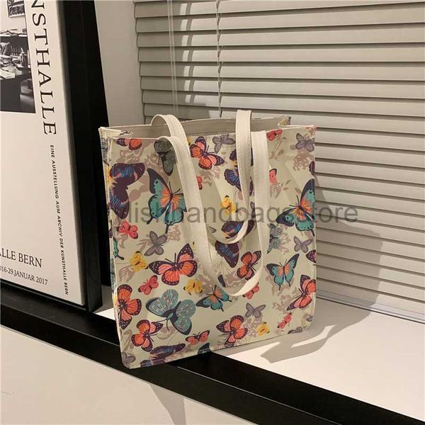 Bolsos de hombro 2023 Nuevo bolso de mujer Bolso estampado de estilo étnico Bolso de lona Bolso de mano Bolso de mano de un hombro Bolso de gran capacidad Bolso elegante bolsos de mano