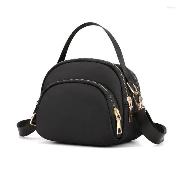 Sacs à bandouliers 2024 Nylon Mini Handle Sac Femmes Retro Handbag Pu Leather Messenger Femelle Small Mobile Phone