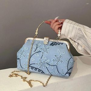 Schoudertassen 2024 retro mode avondtas vintage Chinese stijl geborduurde kleine klauwen voor vrouwen trouwfeest handtas