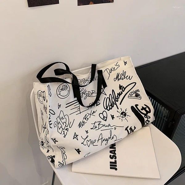 Bolsas de hombro Llegada Bolsa de lienzo para mujeres para 2024 Palabras de impresión Graffiti Big Capaciy Femen's Handbag Lady's Toking