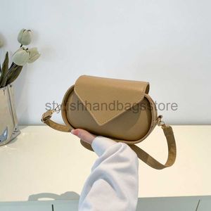 Bolsos de hombro Baobao Mujer Primavera 2023 Nueva moda coreana Litchi Patrón Saddle Bag Mujer Un hombro Crossbody Pequeño cuadrado Bolsostylishhandbagsstore