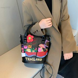 Schoudertassen merk graffiti emmerzakken voor vrouwen mode -borduurwerk schoudertas luxe tas en handtas ontwerper crossbody tas nieuwe tas