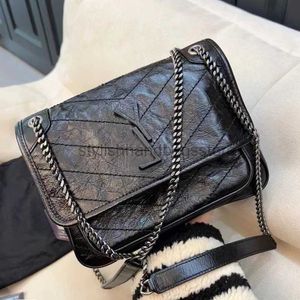 Schoudertassen Designertas Handtas Y-vormig Niki Baby Damesmode Crossbody Klassiekers Luxe echt leer Grote capaciteit Handvat met stofartikelen