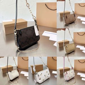 Sacs à bandouliers Sacs de soirée mode Perle Half Moon Sac Fleur Axillary Sac Lady Clutch Gentine Cuir Plain LETTRE FLORAL LETTRE FLORATIQUE PAPELLEUR TOP 5A